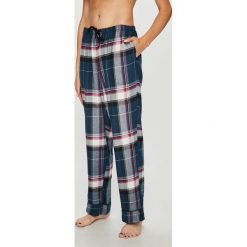 Dkny - Spodnie piżamowe. Niebieskie piżamy damskie DKNY, s, bez wzorów, z poliesteru, bez rękawów. W wyprzedaży za 179,90 zł.