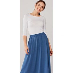 Bluzka Ribolla biała L biały. Białe bluzki damskie Marie Zélie, s, w paski, z elastanu, bez kołnierzyka, bez rękawów. Za 97,00 zł.