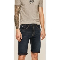 Tommy Jeans - Szorty. Niebieskie spodenki i szorty męskie Tommy Jeans, bez wzorów, z elastanu, casualowe. Za 299,90 zł.