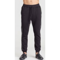 CZARNE SPODNIE DRESOWE TRUSSARDI JEANS. Czarne spodnie męskie Trussardi Jeans, na imprezę, xl, bez wzorów, z bawełny. Za 234,50 zł.
