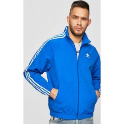 Adidas Originals - Kurtka. Niebieskie płaszcze męskie adidas Originals, m, bez wzorów, z poliesteru, krótkie, bez kaptura. W wyprzedaży za 239,90 zł.