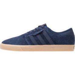 Adidas Originals SEELEY Tenisówki i Trampki collegiate navy. Niebieskie tenisówki damskie marki adidas Originals, z materiału. W wyprzedaży za 247,20 zł.