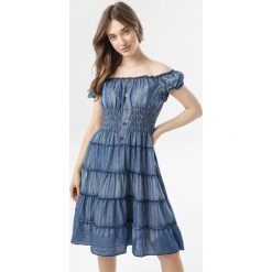 Niebieska Sukienka Coraebelle. Niebieskie sukienki damskie Born2be, xl, bez wzorów, bez kołnierzyka, bez rękawów, mini. W wyprzedaży za 79,99 zł.