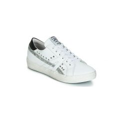 Buty Meline PANNA. Białe trampki i tenisówki damskie Meline, bez wzorów, bez zapięcia. Za 519,00 zł.