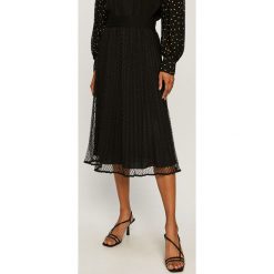 Dkny - Spódnica. Czarne spódniczki damskie DKNY, na co dzień, s, bez wzorów, z poliesteru, casualowe, z podwyższonym stanem, midi, rozkloszowane. Za 579,90 zł.