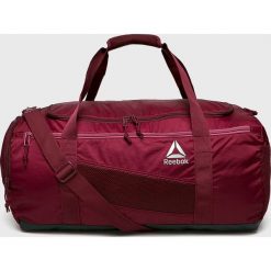 Reebok - Torba. Brązowe torebki damskie sportowe marki Reebok, w paski, z poliesteru, sportowe, na ramię. Za 179,90 zł.