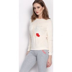Kremowa Bluza Rare. Białe bluzy damskie marki Born2be, z tkaniny, casualowe. Za 19,99 zł.
