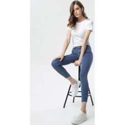 Niebieskie Jeansy Skinny Kerkeis. Niebieskie jeansy damskie Born2be, w paski, z jeansu. Za 79,99 zł.
