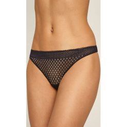 Calvin Klein Underwear - Stringi. Białe majtki damskie Calvin Klein Underwear, s, w koronkowe wzory, z elastanu. Za 119,90 zł.