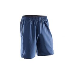 Spodenki fitness kardio FST500 męskie. Niebieskie spodenki sportowe męskie marki DOMYOS, z elastanu. Za 59,99 zł.