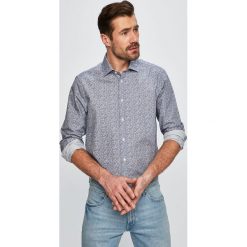 Tommy Hilfiger Tailored - Koszula. Białe koszule męskie Tommy Hilfiger Tailored, bez wzorów, z bawełny, klasyczne, z klasycznym kołnierzykiem, z długim rękawem. W wyprzedaży za 199,90 zł.