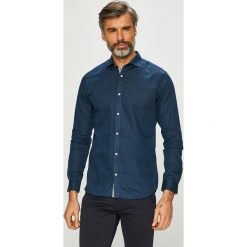 Jack & Jones - Koszula. Niebieskie koszule męskie marki Jack & Jones, m, z bawełny, klasyczne, z klasycznym kołnierzykiem, z długim rękawem. W wyprzedaży za 129,90 zł.