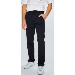 Calvin Klein Jeans - Spodnie. Czarne spodnie męskie Calvin Klein Jeans, z haftami, z bawełny. W wyprzedaży za 159,90 zł.