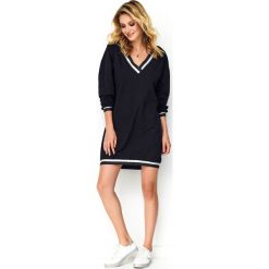 Sukienka oversize sportowa czarna. Czarne sukienki damskie e-margeritka.pl, na co dzień, s, bez wzorów, z bawełny, sportowe, z kontrastowym kołnierzykiem, z długim rękawem, długie, mini, sportowe. Za 168,99 zł.