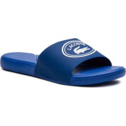 Klapki LACOSTE - L.30 Slide 119 1 Cuj 7-37CUJ0010221 Blue/White. Niebieskie klapki damskie Lacoste, bez wzorów, z tworzywa sztucznego, bez obcasa. W wyprzedaży za 149,00 zł.