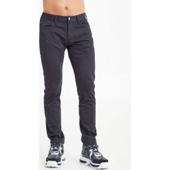SPODNIE EMPORIO ARMANI. Jeansy męskie Emporio Armani, m, bez wzorów, z jeansu. W wyprzedaży za 475,30 zł.