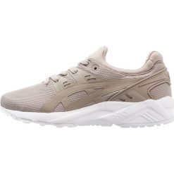 Asics Tiger GELKAYANO TRAINER EVO GS Tenisówki i Trampki moonrock. Szare trampki dziewczęce marki Asics Tiger, z tworzywa sztucznego. Za 299,00 zł.