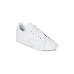 Buty Dziecko adidas STAN SMITH J. Białe trampki dziewczęce marki Adidas, bez wzorów, bez zapięcia. Za 282,49 zł.