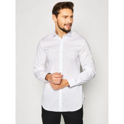 Koszula Guess Alameda M02H13 W7ZK0. Czarne koszule męskie Guess, m, z aplikacjami, z bawełny, biznesowe, bez kołnierzyka, bez rękawów. W wyprzedaży za 219,00 zł.
