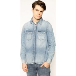 Koszula Calvin Klein Jeans Distressed J30J315313. Niebieskie koszule męskie Calvin Klein Jeans, xl, bez wzorów, z bawełny, casualowe, bez kołnierzyka, bez rękawów. Za 449,00 zł.