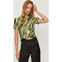 Guess Jeans - T-shirt. Czarne bluzki damskie Guess Jeans, s, z aplikacjami, z elastanu, casualowe, z okrągłym kołnierzem. Za 219,90 zł.