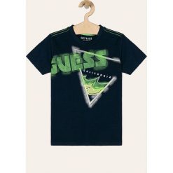Guess Jeans - T-shirt dziecięcy 118-175 cm. Białe t-shirty chłopięce Guess Jeans, z nadrukiem, z bawełny, bez rękawów. Za 89,90 zł.