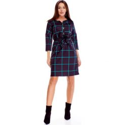 Sukienka o koszulowym kroju z wiązaniem w pasie czarny. Czarne sukienki damskie N/A, xl, bez wzorów, z wiskozy, z koszulowym kołnierzykiem, plus size, bez rękawów, koszulowe. Za 153,19 zł.