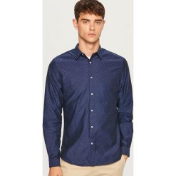 Koszula slim fit z bawełny strukturalnej - Granatowy. Niebieskie koszule męskie slim marki TRIBORD, m, z bawełny. Za 99,99 zł.