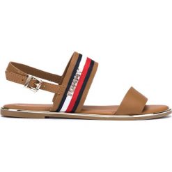 Tommy Hilfiger Sandały Brązowy. Pomarańczowe sandały damskie TOMMY HILFIGER, w paski, ze skóry, bez obcasa, z paskami. Za 430,95 zł.