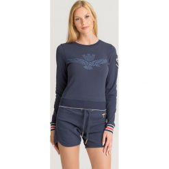 BLUZA GIROCOLLO Aeronautica Militare. Niebieskie bluzy damskie Aeronautica Militare, s, z aplikacjami, bez rękawów, bez kaptura. Za 509,00 zł.