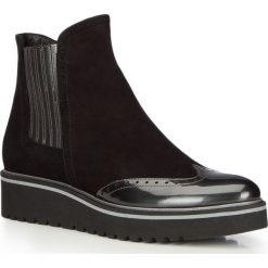 Buty damskie. Czarne botki damskie Wittchen, ze skóry, sportowe, bez obcasa, na platformie, bez zapięcia. W wyprzedaży za 599,90 zł.