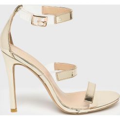 Public Desire - Szpilki HELIOS. Żółte sandały damskie marki Public Desire, z materiału, na obcasie, na klamry. W wyprzedaży za 99,90 zł.
