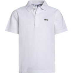 Lacoste Sport TENNIS Koszulka polo white. Białe t-shirty chłopięce Lacoste Sport, z bawełny. W wyprzedaży za 175,20 zł.