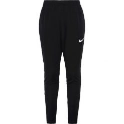 Nike Performance DRY PANT Spodnie treningowe black/white. Czarne spodnie chłopięce Nike Performance, z materiału. W wyprzedaży za 125,10 zł.