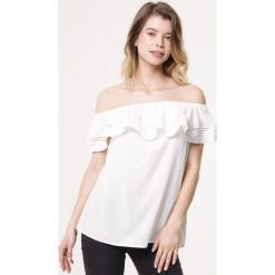 Biała Bluzka Magical Time. Białe bluzki damskie Born2be, s, w koronkowe wzory, z koronki, bez kołnierzyka, z krótkim rękawem. Za 49,99 zł.