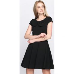 Czarna Sukienka Treat Me. Czarne sukienki letnie marki Born2be, s, mini. Za 89,99 zł.