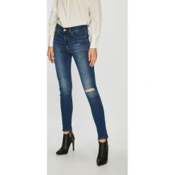 Levi's - Jeansy 311. Brązowe jeansy damskie rurki marki Levi's®, z bawełny. Za 349,90 zł.
