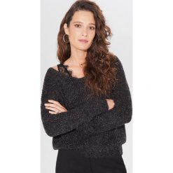 Połyskujący sweter oversize - Czarny. Czarne swetry damskie Mohito, s. W wyprzedaży za 59,99 zł.