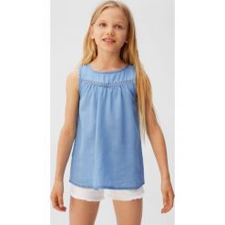 Mango Kids - Koszula 110 - 164 cm. Bluzki dziewczęce Mango Kids, bez wzorów, z lyocellu, z okrągłym kołnierzem, bez rękawów, bez kaptura. W wyprzedaży za 49,90 zł.