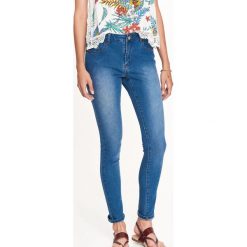 JEANSY DAMSKIE, RURKI. Niebieskie jeansy damskie rurki marki TROLL, na zimę, xl, z jeansu. W wyprzedaży za 59,99 zł.