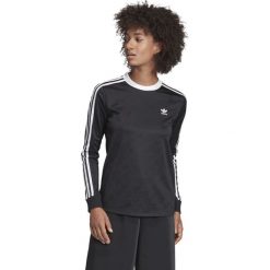 Adidas Originals Koszulka Czarny. Czarne koszulki damskie adidas Originals, bez wzorów, z elastanu, bez kołnierzyka. Za 171,95 zł.