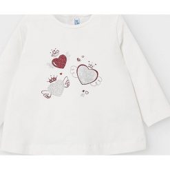 Mayoral - Longsleeve dziecięcy 68-98 cm. Białe bluzki dziewczęce Mayoral, z nadrukiem, z elastanu, z okrągłym kołnierzem, z długim rękawem, długie, bez kaptura. Za 57,90 zł.
