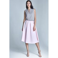 Różowa spódnica midi z kieszeniami. Różowe spódniczki damskie NIFE, na wiosnę, xl, bez wzorów, z elastanu, eleganckie, midi, sportowe. Za 129,00 zł.