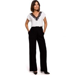 Czarne Stylowe Spodnie na Gumie z Szerokimi Nogawkami. Czarne spodnie męskie Moe, s, bez wzorów, z wiskozy, eleganckie. Za 178,90 zł.
