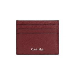 Portfele Calvin Klein Jeans K50K503481 PEBBLE LEATHER CARDH. Czerwone portfele męskie Calvin Klein Jeans, bez wzorów, z jeansu. Za 131,25 zł.