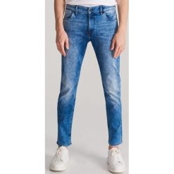 Jeansy slim z efektem sprania - Niebieski. Niebieskie jeansy męskie Reserved, m, bez wzorów. Za 169,99 zł.
