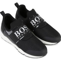 Boss - Buty dziecięce. Czarne trampki chłopięce Boss, bez wzorów, ze skóry, sportowe, z okrągłym noskiem, bez zapięcia. W wyprzedaży za 449,90 zł.