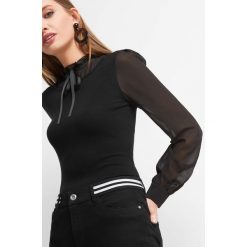 Sweter z balonowym rękawem. Czarne bez kategorii Orsay, s, z poliesteru, eleganckie, ze stójką. Za 99,99 zł.