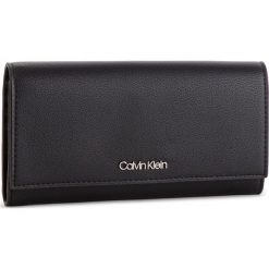 Duży Portfel Damski CALVIN KLEIN - Tack Lrg Trifold K60K604852 001. Czarne portfele damskie marki Calvin Klein, bez wzorów, ze skóry ekologicznej. Za 279,00 zł.
