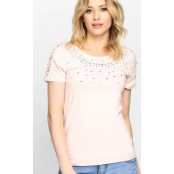 Różowa Bluzka Torrent Pearl. Czerwone bralety marki Born2be, m. Za 49,99 zł.